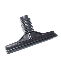 Black window squeegee attachment for steam machine, used for efficient glass cleaning and streak-free shine